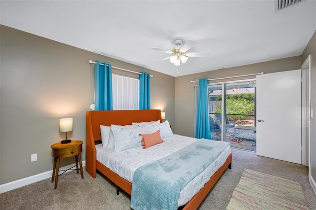 3749 Mckay Creek Dr, Largo, FL 33770 - carpeted bedroom with access to outside, a ceiling fan, and baseboards