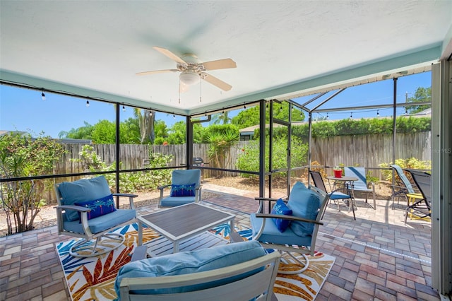 3749 Mckay Creek Dr, Largo, FL 33770 - sunroom with ceiling fan and outdoor lounge area