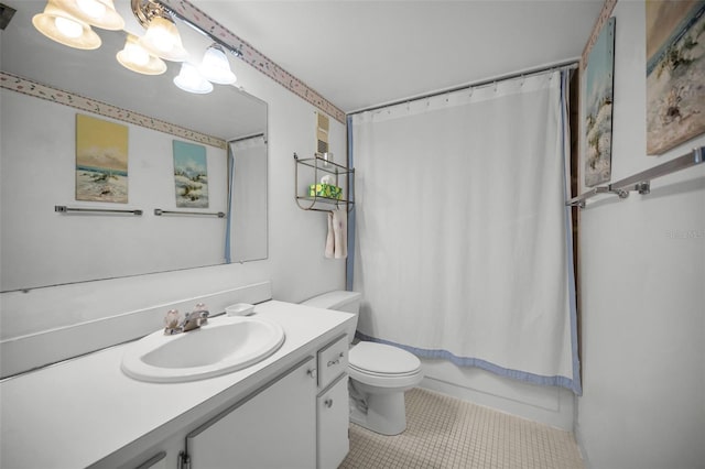 8 Glencoe Pl Unit 305, Dunedin, FL 34698 - full bathroom with tile patterned floors, vanity, toilet, and shower / tub combo with curtain
