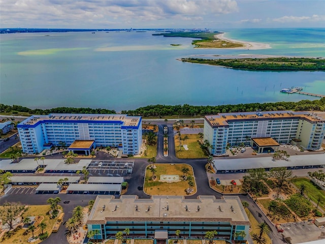 8 Glencoe Pl Unit 305, Dunedin, FL 34698 - bird's eye view of a large body of water and apartment complex