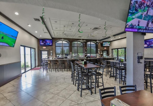dining area featuring light tile patterned flooring and recessed lighting