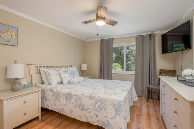 8240 144th Ln, Seminole, FL 33776 - bedroom with light wood finished floors, ornamental molding, and ceiling fan