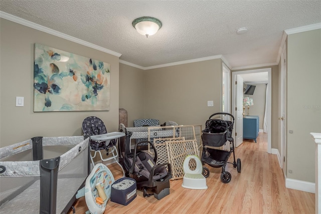 8240 144th Ln, Seminole, FL 33776 - bedroom featuring wood finished floors, a textured ceiling, baseboards, and ornamental molding