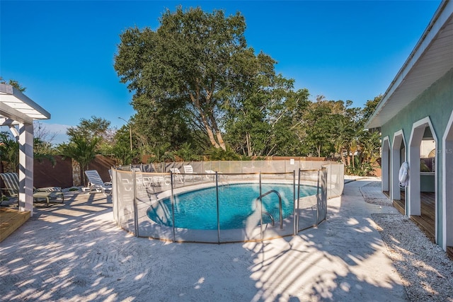 8240 144th Ln, Seminole, FL 33776 - view of swimming pool featuring a patio and a fenced backyard