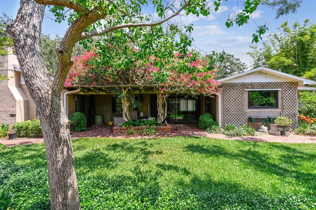 750 Alda Way NE, Saint Petersburg, FL 33704 - view of front of house featuring a front lawn