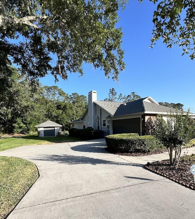 2528 Deerbrook Dr, Lakeland, FL 33811 - view of front facade with concrete driveway and a garage