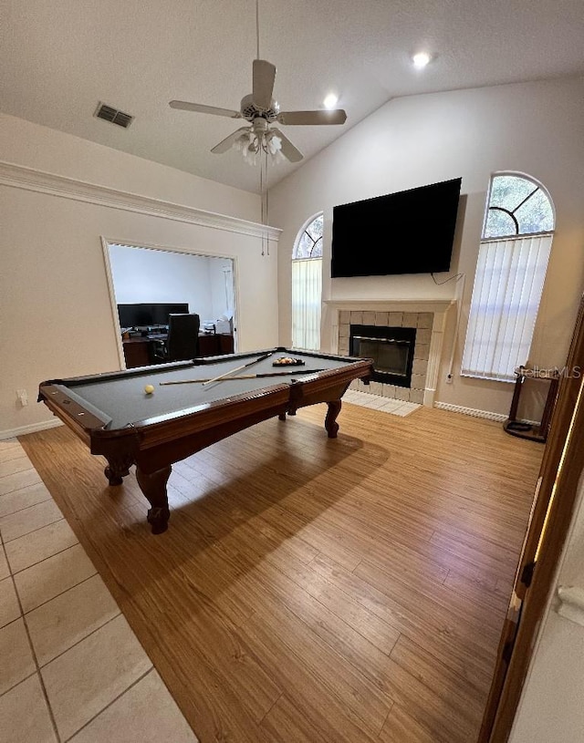 2528 Deerbrook Dr, Lakeland, FL 33811 - playroom featuring a fireplace, billiards, vaulted ceiling, ceiling fan, and baseboards