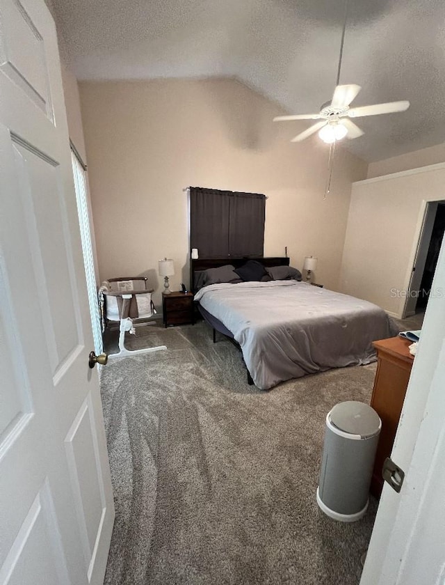 2528 Deerbrook Dr, Lakeland, FL 33811 - bedroom with lofted ceiling, carpet, a textured ceiling, and ceiling fan