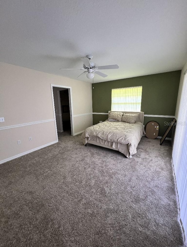 2528 Deerbrook Dr, Lakeland, FL 33811 - carpeted bedroom featuring ceiling fan and baseboards
