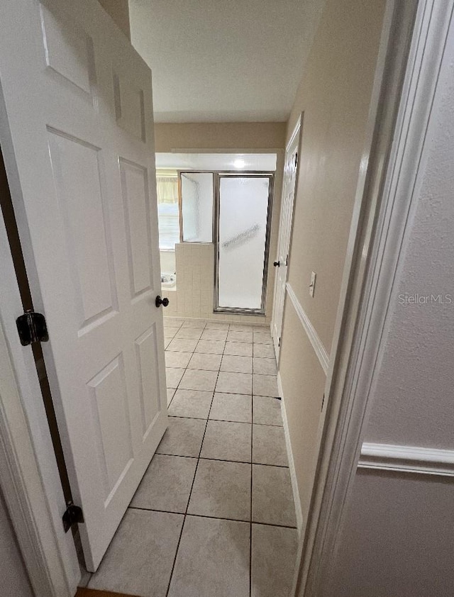 2528 Deerbrook Dr, Lakeland, FL 33811 - hall with light tile patterned floors