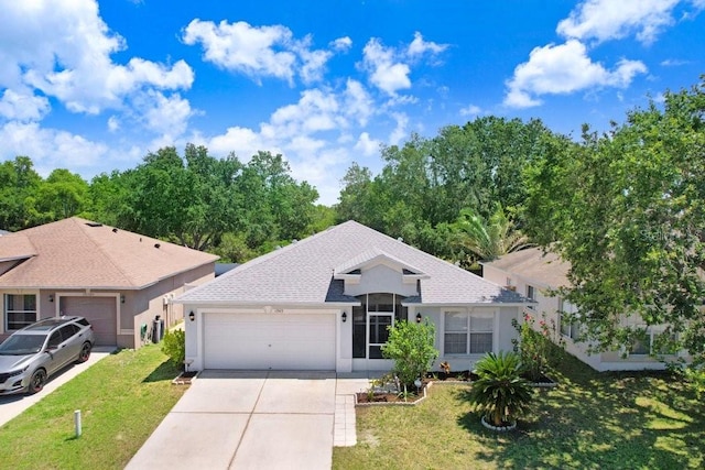 13523 Prestwick Dr, Riverview, FL 33579 - ranch-style house featuring a garage, driveway, stucco siding, a front lawn, and a shingled roof