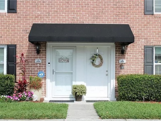 2557 Cedar Cypress Ct, Tampa, FL 33618 - entrance to property featuring brick siding