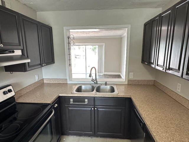 2557 Cedar Cypress Ct, Tampa, FL 33618 - kitchen with stainless steel electric stove, ventilation hood, light countertops, and dark cabinetry