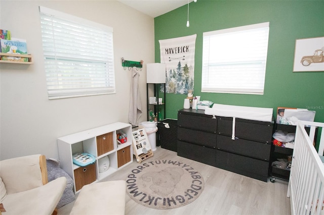 bedroom featuring wood finished floors
