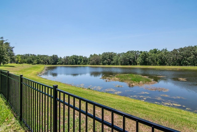 water view featuring fence