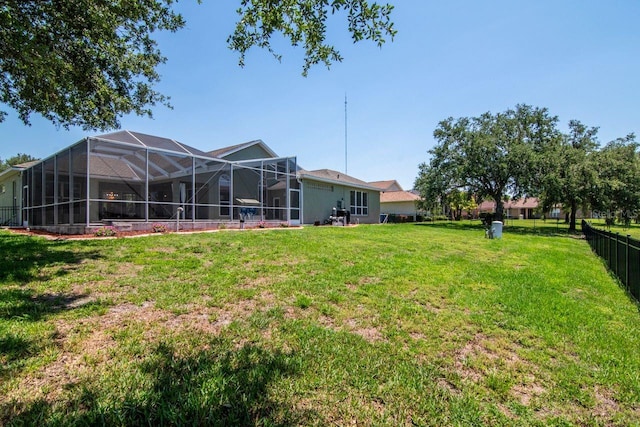 view of yard with a lanai