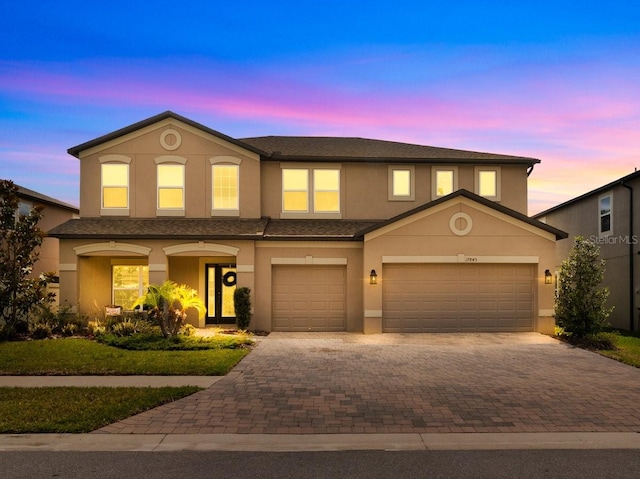 17845 Cortes Creek Blvd, Spring Hill, FL 34610 - view of front of property with driveway and stucco siding