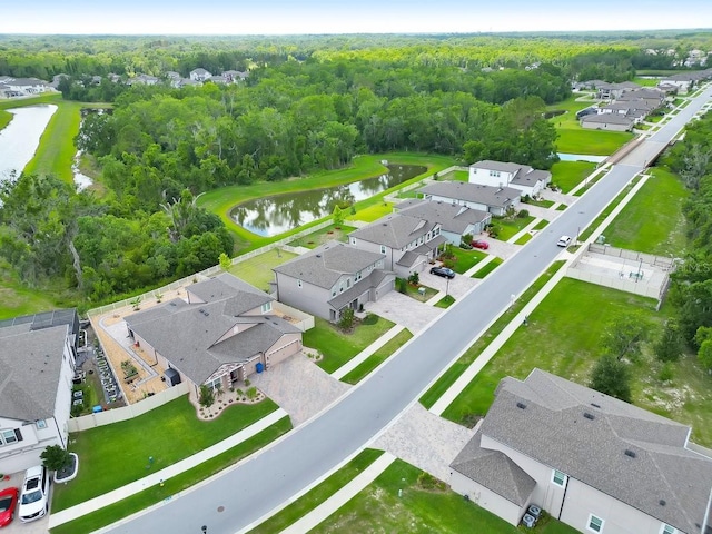 17845 Cortes Creek Blvd, Spring Hill, FL 34610 - aerial perspective of suburban area featuring a nearby body of water and a heavily wooded area