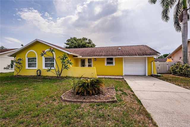 10051 82nd Ln, Seminole, FL 33777 - ranch-style house featuring stucco siding, an attached garage, and driveway