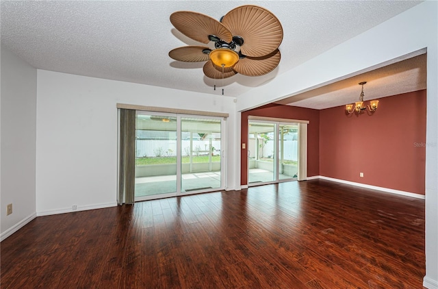 10051 82nd Ln, Seminole, FL 33777 - unfurnished room with a ceiling fan, wood finished floors, a chandelier, baseboards, and a textured ceiling