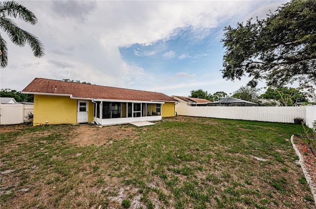 10051 82nd Ln, Seminole, FL 33777 - rear view of house featuring a sunroom