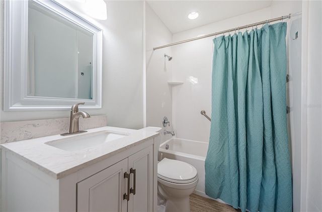 10051 82nd Ln, Seminole, FL 33777 - bathroom featuring vanity, toilet, and shower / bath combo with shower curtain