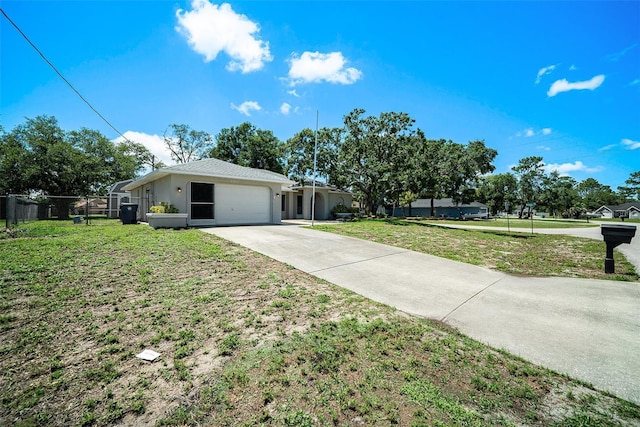 3305 Blythe Ave, Spring Hill, FL 34609 - ranch-style house featuring an attached garage, driveway, and stucco siding