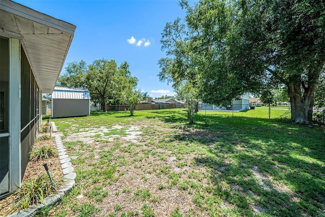 3305 Blythe Ave, Spring Hill, FL 34609 - view of yard featuring a storage shed and an outdoor structure