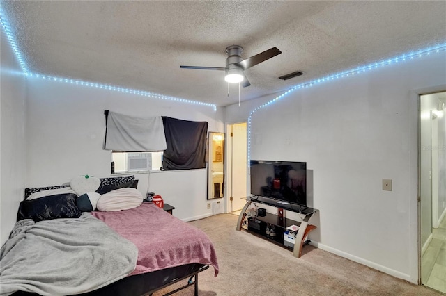 1716 Bayou Cir, Lakeland, FL 33803 - bedroom featuring a textured ceiling, light carpet, cooling unit, and baseboards