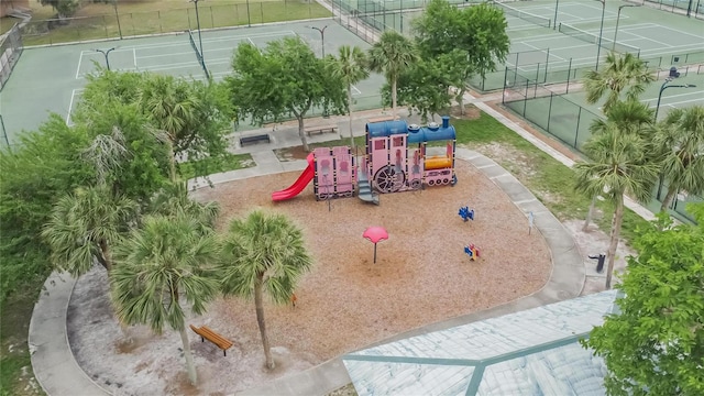 1716 Bayou Cir, Lakeland, FL 33803 - community jungle gym with a tennis court and fence
