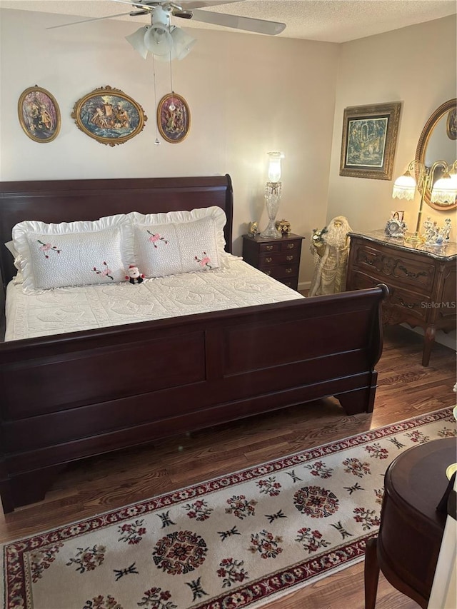 9302 Trowbridge Ct, New Port Richey, FL 34655 - bedroom featuring wood finished floors and ceiling fan