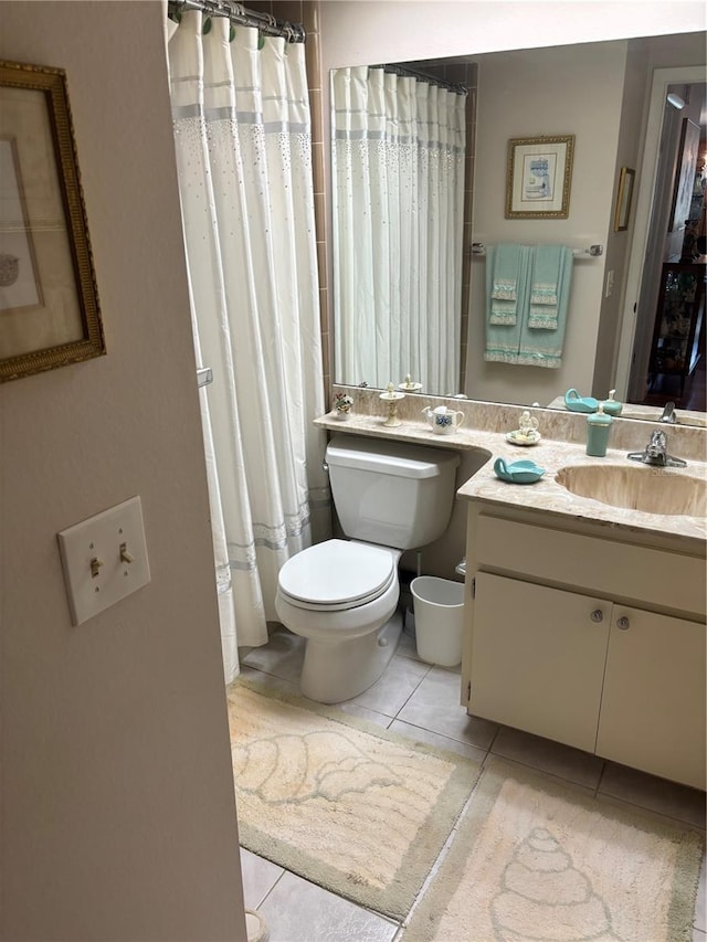 9302 Trowbridge Ct, New Port Richey, FL 34655 - bathroom featuring tile patterned floors, toilet, vanity, and a shower with curtain