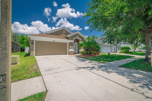 19247 Otters Wick Way, Land O Lakes, FL 34638 - single story home featuring an attached garage, stucco siding, concrete driveway, and a front lawn