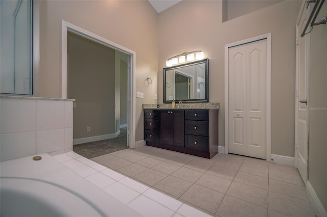 19247 Otters Wick Way, Land O Lakes, FL 34638 - full bath featuring tile patterned floors, vanity, and baseboards