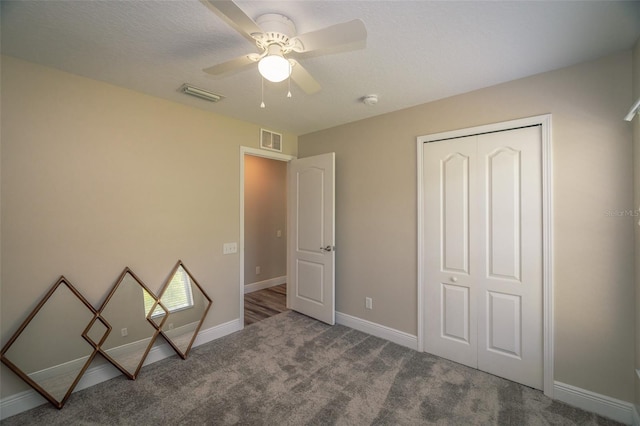 19247 Otters Wick Way, Land O Lakes, FL 34638 - unfurnished bedroom featuring carpet floors, baseboards, ceiling fan, and a closet