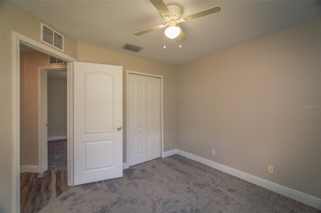 19247 Otters Wick Way, Land O Lakes, FL 34638 - unfurnished bedroom featuring a closet, baseboards, carpet floors, and ceiling fan