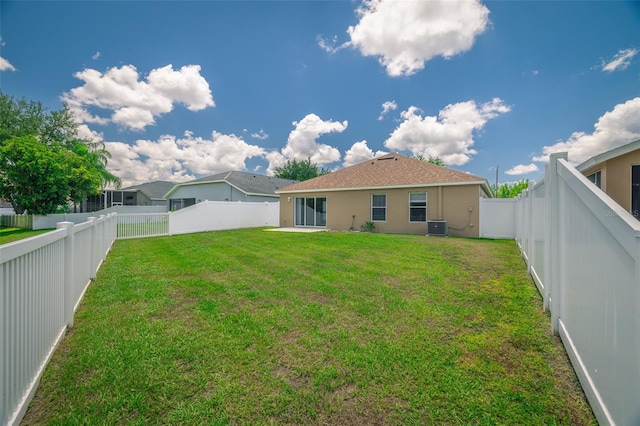 19247 Otters Wick Way, Land O Lakes, FL 34638 - back of property featuring stucco siding and central AC