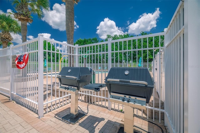 19247 Otters Wick Way, Land O Lakes, FL 34638 - view of patio featuring fence and area for grilling