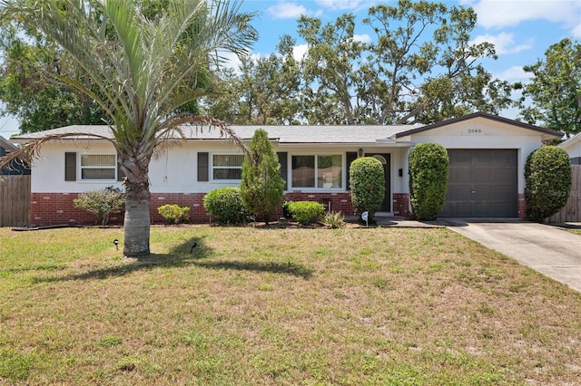 2048 64th Ave S, Saint Petersburg, FL 33712 - ranch-style house featuring brick siding, an attached garage, and concrete driveway