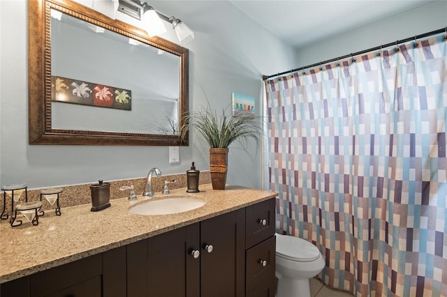 2048 64th Ave S, Saint Petersburg, FL 33712 - full bathroom featuring vanity, toilet, a shower with curtain, and tile patterned floors