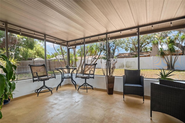 2048 64th Ave S, Saint Petersburg, FL 33712 - sunroom featuring concrete flooring