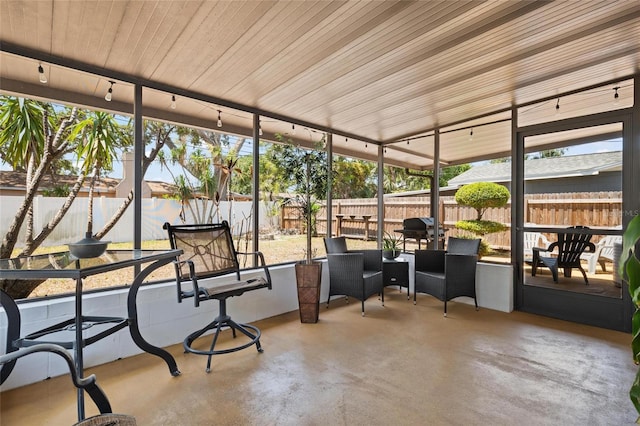 2048 64th Ave S, Saint Petersburg, FL 33712 - sunroom with finished concrete floors