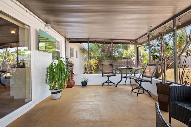 2048 64th Ave S, Saint Petersburg, FL 33712 - sunroom / solarium with healthy amount of natural light and outdoor dining space