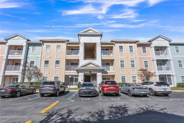 4991 Key Lime Dr Unit 104, Jacksonville, FL 32256 - view of building exterior with uncovered parking