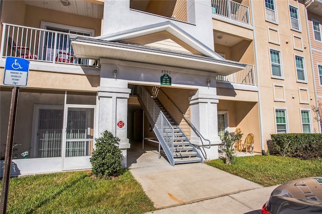 4991 Key Lime Dr Unit 104, Jacksonville, FL 32256 - view of property with stairway