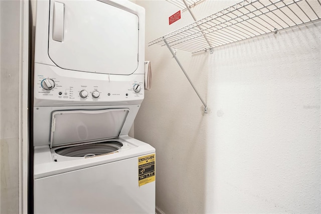 4991 Key Lime Dr Unit 104, Jacksonville, FL 32256 - clothes washing area featuring stacked washer / drying machine