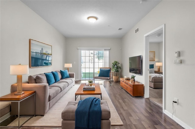 4991 Key Lime Dr Unit 104, Jacksonville, FL 32256 - living room with wood finished floors and baseboards