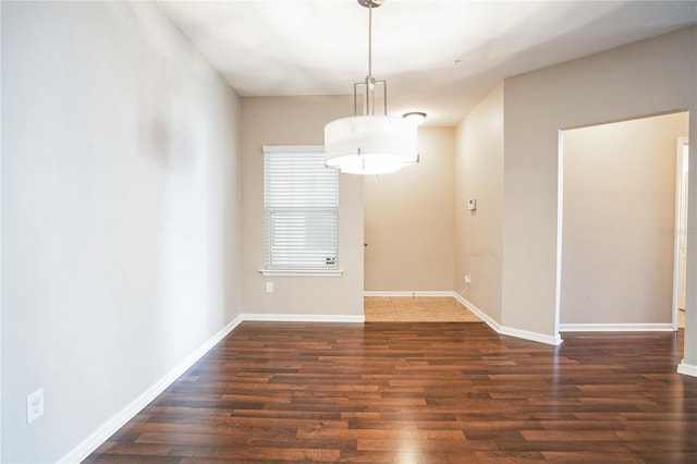 4991 Key Lime Dr Unit 104, Jacksonville, FL 32256 - spare room with wood finished floors and baseboards