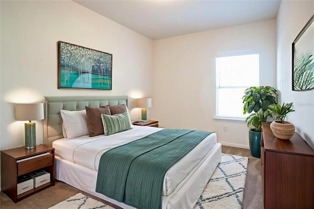 4991 Key Lime Dr Unit 104, Jacksonville, FL 32256 - bedroom with baseboards and carpet floors
