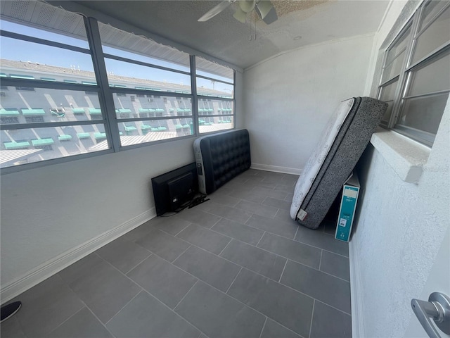 2011 58th Ave N Unit 20, Saint Petersburg, FL 33714 - unfurnished sunroom featuring a ceiling fan and lofted ceiling
